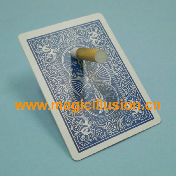 Cigarette through playing card